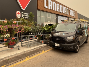 commercial security maintenance appointment with a SecurU service van outside of a retail job site